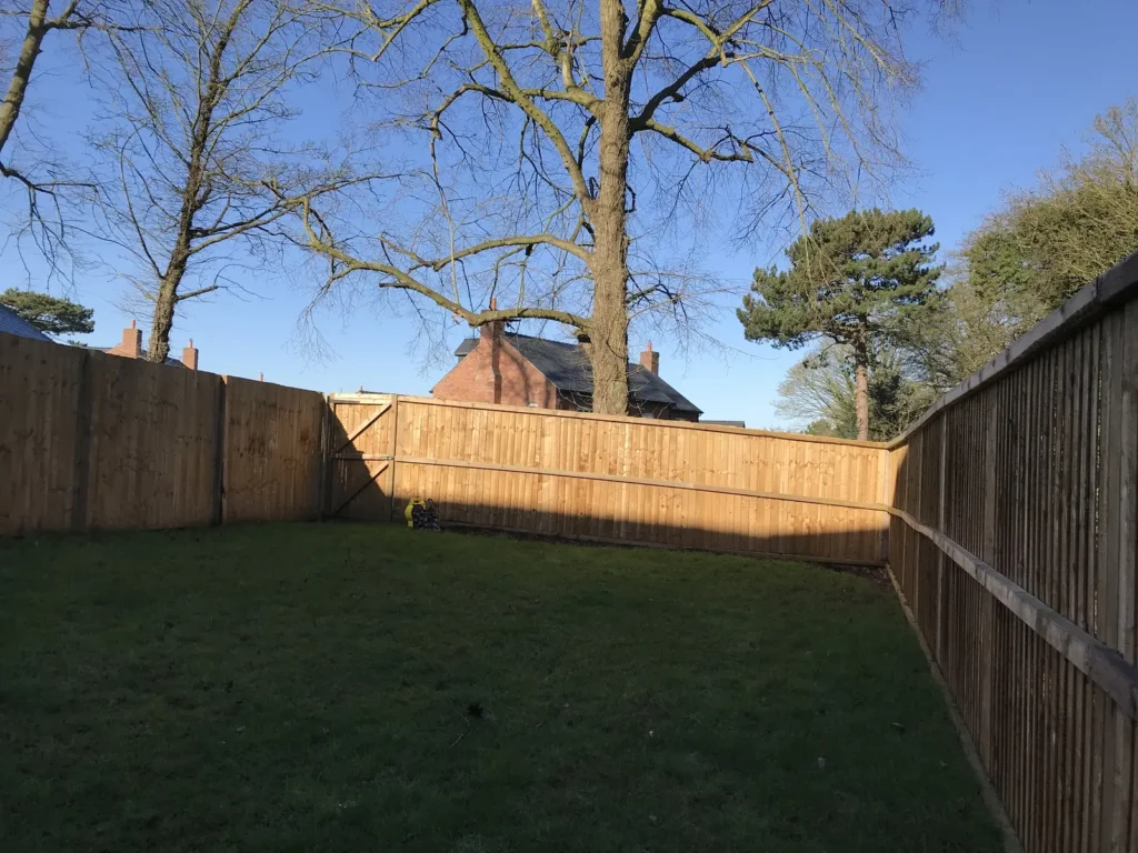 Blank lawn garden with compacted ground before the Malpas courtyard makeover