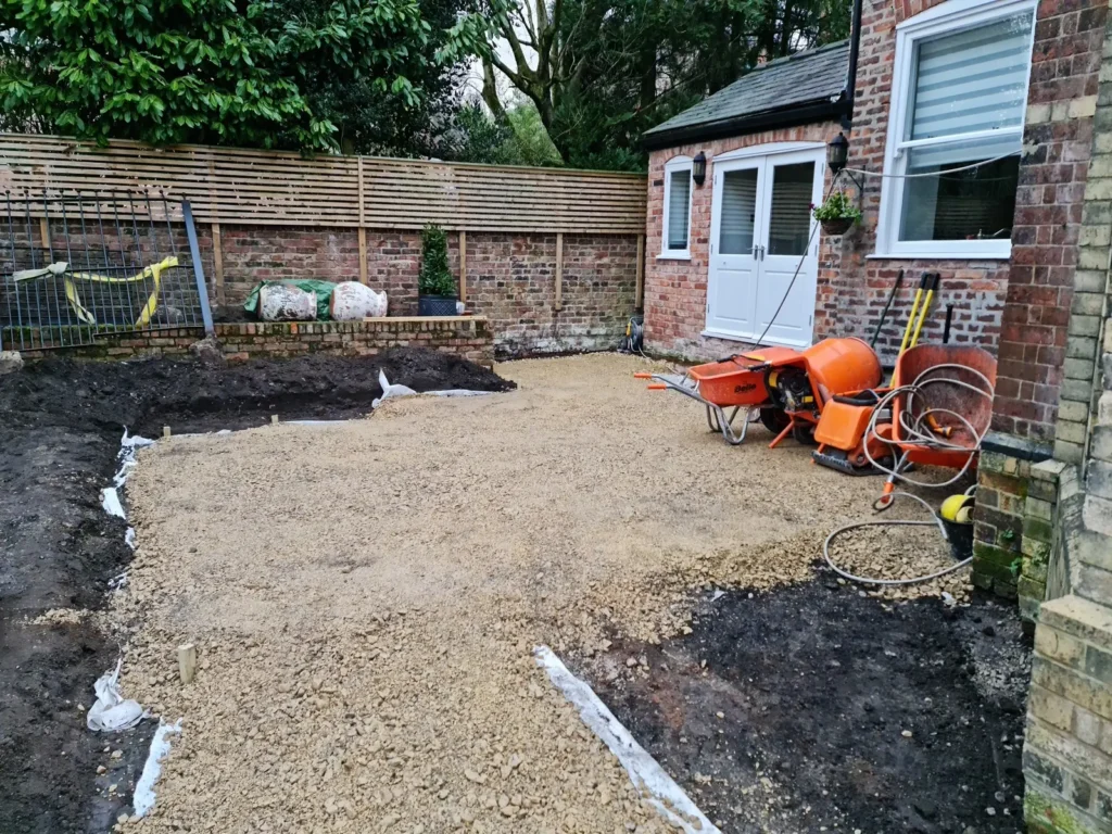 Subbase preparation for paved garden areas beside Victorian property in Altrincham